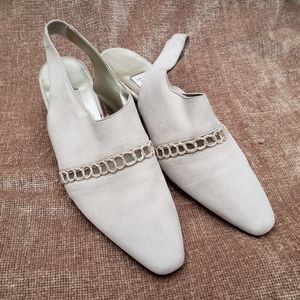 Designer size six beige suede low heel